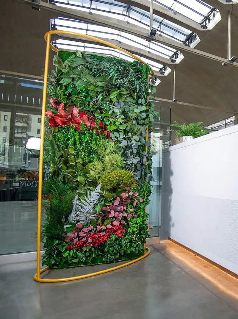 Vertical indoor garden with diverse lush plants