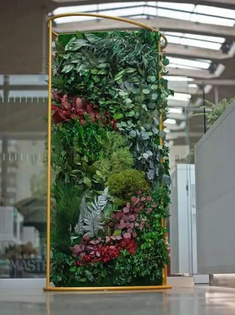 Indoor vertical garden with diverse green plants